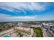 Expansive aerial view featuring clear blue skies over the city and nearby buildings and surrounding landscape at 800 N Tamiami Trl # 1217, Sarasota, FL 34236