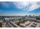 Wide aerial view of the city, featuring the surrounding buildings and lush landscaping at 800 N Tamiami Trl # 1217, Sarasota, FL 34236