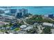 Breathtaking aerial view highlighting condo near water with picturesque walking paths, and a nearby performing arts center at 800 N Tamiami Trl # 1217, Sarasota, FL 34236