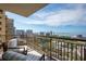 Enjoy city views from the balcony in this condo with comfortable outdoor seating at 800 N Tamiami Trl # 1217, Sarasota, FL 34236