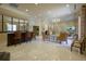 Chic common area with a bar, seating, and decorative lighting at 800 N Tamiami Trl # 1217, Sarasota, FL 34236