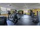 Spacious gym featuring cardio machines and free weights at 800 N Tamiami Trl # 1217, Sarasota, FL 34236