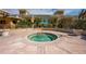 Relaxing hot tub surrounded by lush landscaping at 800 N Tamiami Trl # 1217, Sarasota, FL 34236