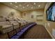 Comfortable movie theater room with tiered seating at 800 N Tamiami Trl # 1217, Sarasota, FL 34236