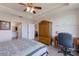 This main bedroom features wood furniture and bathroom access at 8414 Wethersfield Run # 102, Lakewood Ranch, FL 34202