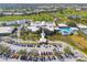 Aerial view of the Plantation Golf & Country Club with golf course and extensive amenities at 905 Barclay Ct, Venice, FL 34293