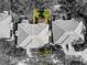 Back aerial view of the home highlighting the backyard, landscaping, and private lanai at 905 Barclay Ct, Venice, FL 34293