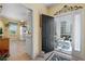 View from the entryway into the kitchen and lanai, highlighting the home's layout at 905 Barclay Ct, Venice, FL 34293