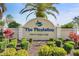 Entrance sign for The Plantation Golf & Country Club with manicured landscaping at 905 Barclay Ct, Venice, FL 34293