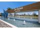 Del Webb BayView entrance featuring striking water features and lush landscaping in a vibrant community at 10470 Spring Tide Way, Parrish, FL 34219