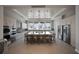 Spacious kitchen features a large island, stainless steel appliances, and ample storage space at 10470 Spring Tide Way, Parrish, FL 34219