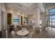 Stylish community lounge featuring modern decor, comfortable seating, and multiple TVs at 10470 Spring Tide Way, Parrish, FL 34219