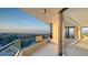 Relax on this balcony overlooking city and water views with glass railings and tiled floor at 1211 Gulf Of Mexico Dr # 701, Longboat Key, FL 34228