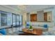 Inviting lobby area with modern furniture, elegant decor, and a welcoming reception desk with marble countertops at 1211 Gulf Of Mexico Dr # 701, Longboat Key, FL 34228