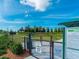 Community dog park area with separate sections for large and small dogs, promoting a pet-friendly lifestyle at 12325 Marsh Pointe Rd, Sarasota, FL 34238
