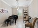 Charming office featuring a piano, decorative lighting, and neutral wall paint at 12325 Marsh Pointe Rd, Sarasota, FL 34238