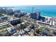 Coastal property near the beach with stunning ocean views and modern buildings surrounding the neighborhood at 132 Harrison Dr, Sarasota, FL 34236