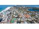 High-angle view of the property near the beach, offering potential buyers a glimpse of coastal living at 132 Harrison Dr, Sarasota, FL 34236
