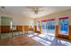 Bright and airy living room with tiled floors and large windows offering plenty of natural light at 132 Harrison Dr, Sarasota, FL 34236