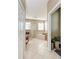 Spacious and open primary bathroom with tile floors, shower, soaking tub, and private toilet room at 1522 3Rd Street E Cir, Palmetto, FL 34221
