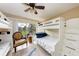 Bedroom with a bunk bed and view of the courtyard at 1522 3Rd Street E Cir, Palmetto, FL 34221