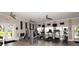 Well-equipped gym with modern exercise machines and a view of the outdoors, perfect for fitness enthusiasts at 1522 3Rd Street E Cir, Palmetto, FL 34221