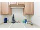 Laundry room with cabinets, a deep sink, and countertop space at 1522 3Rd Street E Cir, Palmetto, FL 34221