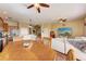 This open concept home combines the kitchen, dining, and living areas, creating an inviting and cohesive living space at 1522 3Rd Street E Cir, Palmetto, FL 34221