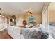 Inviting living room with hardwood floors, a comfortable sectional sofa, and a sliding glass door to a balcony at 1522 3Rd Street E Cir, Palmetto, FL 34221