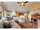 Spacious living room with an open floor plan, seamlessly connecting to the kitchen and dining areas at 1522 3Rd Street E Cir, Palmetto, FL 34221