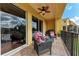 Relax on this lovely patio featuring comfortable seating, brick flooring, and a view of the beautiful outdoors at 1522 3Rd Street E Cir, Palmetto, FL 34221