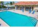 Outdoor swimming pool with lounge chairs around the deck for residents to relax and soak up the sun at 1522 3Rd Street E Cir, Palmetto, FL 34221
