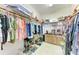 Spacious walk-in closet with built-in shelving, shoe racks, and storage drawers at 1522 3Rd Street E Cir, Palmetto, FL 34221