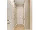 Hallway with tile floor and neutral paint at 167 Maraviya Blvd, Nokomis, FL 34275