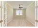 Home office with carpet flooring, ceiling fan, and plenty of natural light at 167 Maraviya Blvd, Nokomis, FL 34275