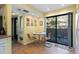 Eat-in kitchen dining area with a table and sliding glass door to the patio at 1680 Brookhouse Cir # 110, Sarasota, FL 34231