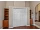 Hallway with ample closet space and shelving at 2002 Palm View Rd, Sarasota, FL 34240