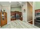 Spacious kitchen with stainless appliances and eat in bar at 2002 Palm View Rd, Sarasota, FL 34240