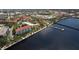 Waterfront building with community walking path along the water, lush landscaping and a pier at 210 3Rd W St # 8204, Bradenton, FL 34205