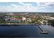 Waterfront building with community walking path along the water, lush landscaping and a pier at 210 3Rd W St # 8204, Bradenton, FL 34205