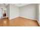 Bedroom featuring neutral walls and hardwood floors at 210 3Rd W St # 8204, Bradenton, FL 34205