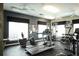 Well-equipped fitness center with treadmills, bikes, and weight machines, promoting a healthy lifestyle at 210 3Rd W St # 8204, Bradenton, FL 34205