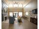 Spacious living room with high ceilings, fireplace, and elegant decor, creating a welcoming atmosphere at 210 3Rd W St # 8204, Bradenton, FL 34205