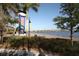 Picturesque park view with walkway, lush greenery, and water views at 210 3Rd W St # 8204, Bradenton, FL 34205