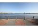 Scenic waterfront view with railing overlooking the beautiful blue water and bridge at 210 3Rd W St # 8204, Bradenton, FL 34205