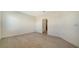 Empty bedroom featuring neutral walls and floors, and a closet at 217 Potenza Loop, North Venice, FL 34275