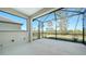 Screened-in patio offers serene views, perfect for relaxing and enjoying the beautiful outdoors at 217 Potenza Loop, North Venice, FL 34275