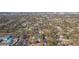 An aerial view of mature trees and landscaping in the surrounding neighborhood, with a view of local businesses nearby at 2300 23Rd S St, St Petersburg, FL 33712