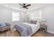 Cozy bedroom with a ceiling fan, natural light, and neutral color palette at 2300 23Rd S St, St Petersburg, FL 33712