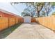 Long driveway leading to the house and detached garage, providing ample parking space and convenience at 2300 23Rd S St, St Petersburg, FL 33712
